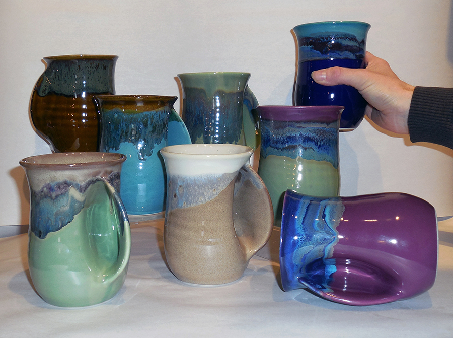 https://www.cedarcreekpottery.com/wp-content/uploads/2014/07/Handwarmer-Mugs.jpg